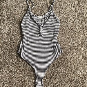 Stripped body suit